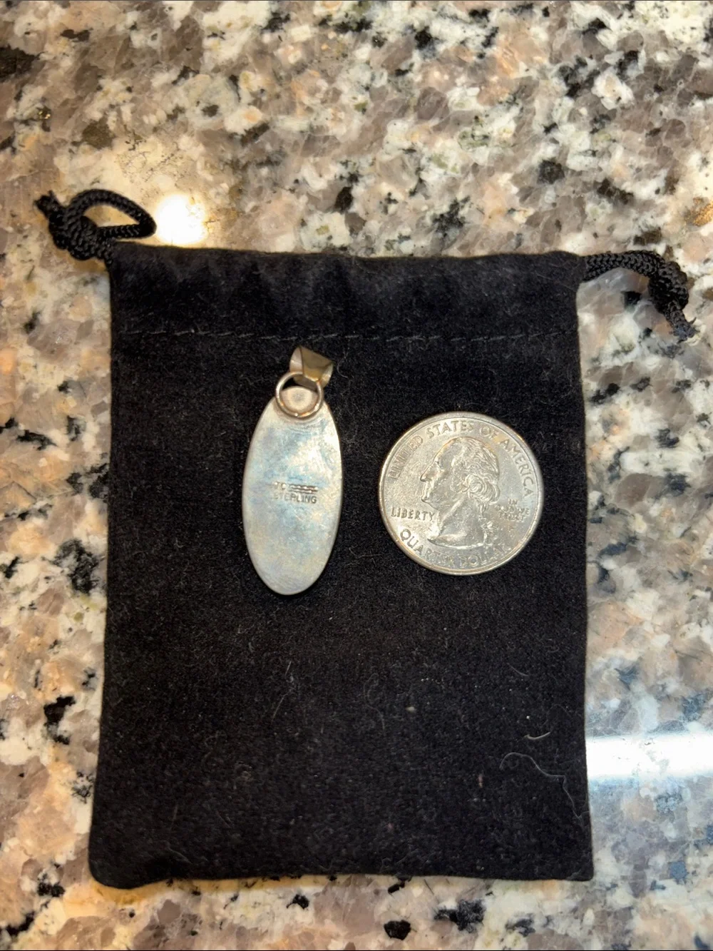 Stamped sterling silver and Turquoise Oval Pendant